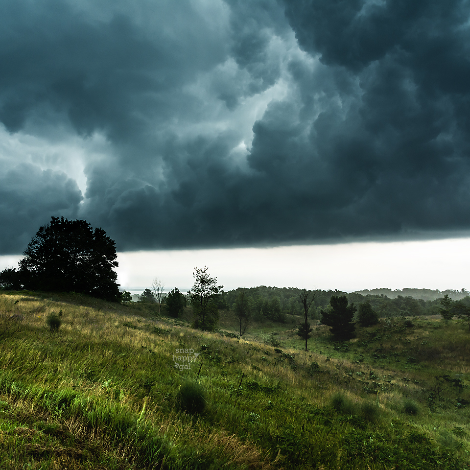 Photo: Dark clouds and fierce winds appear after the arrival of a summer storm in northern Michigan