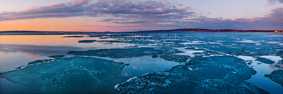 Photo: Partially frozen Grand Traverse Bay, colorful sunset